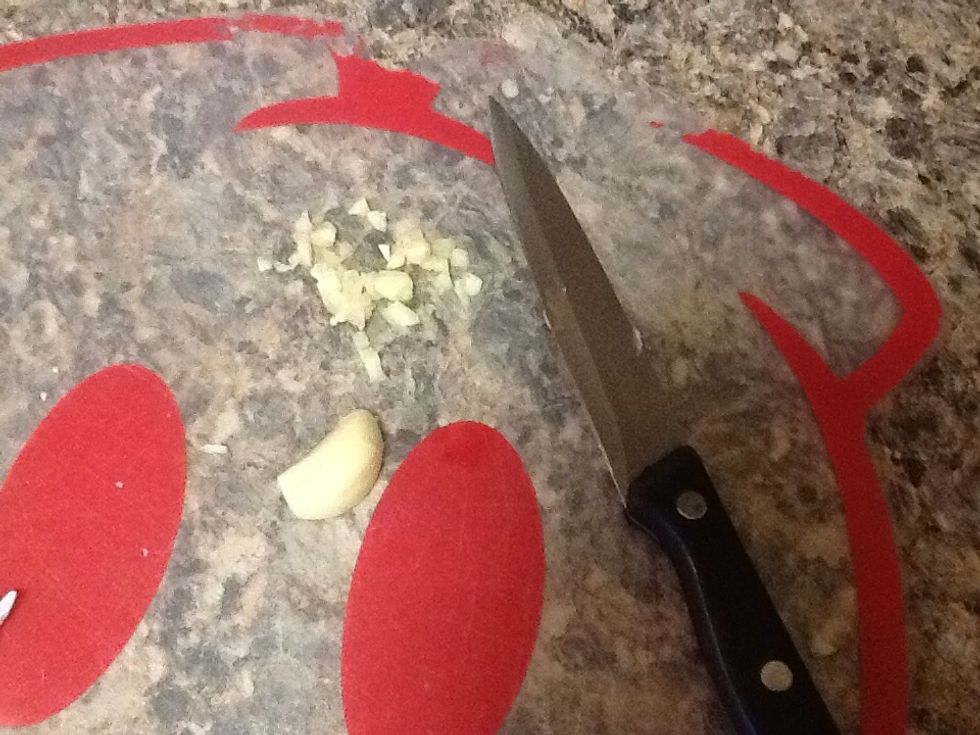 Finely mince garlic.