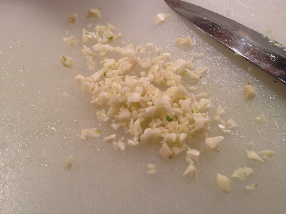 Finely mince the garlic.