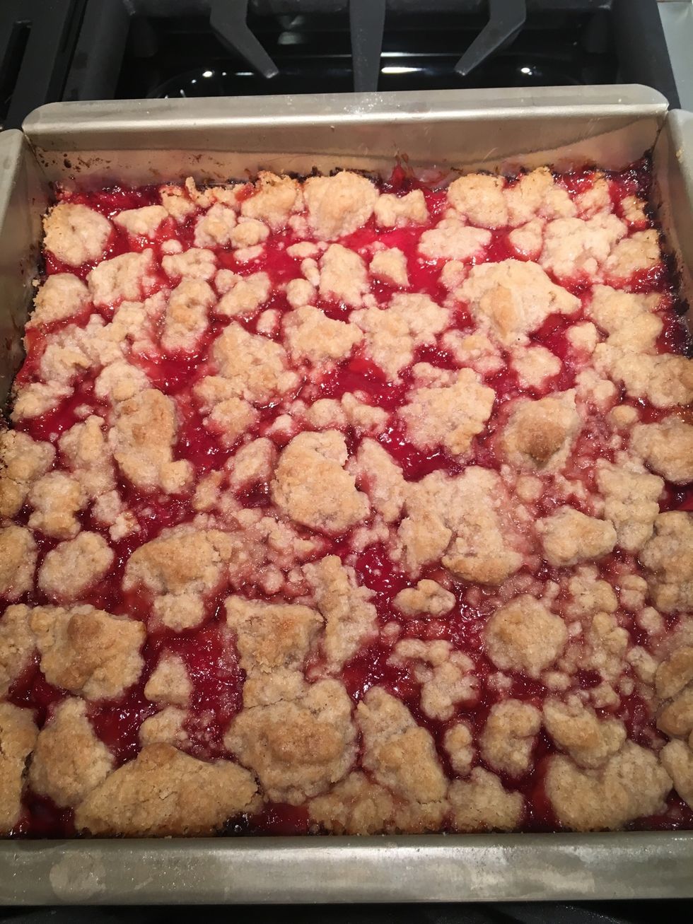 Finis! Let them cool before you cut them. You might notice the dark edges. I'm not going to lie- I should've lined the pan with parchment, Crumb Cake style. I was lazy, so, I'm just going to trim it.