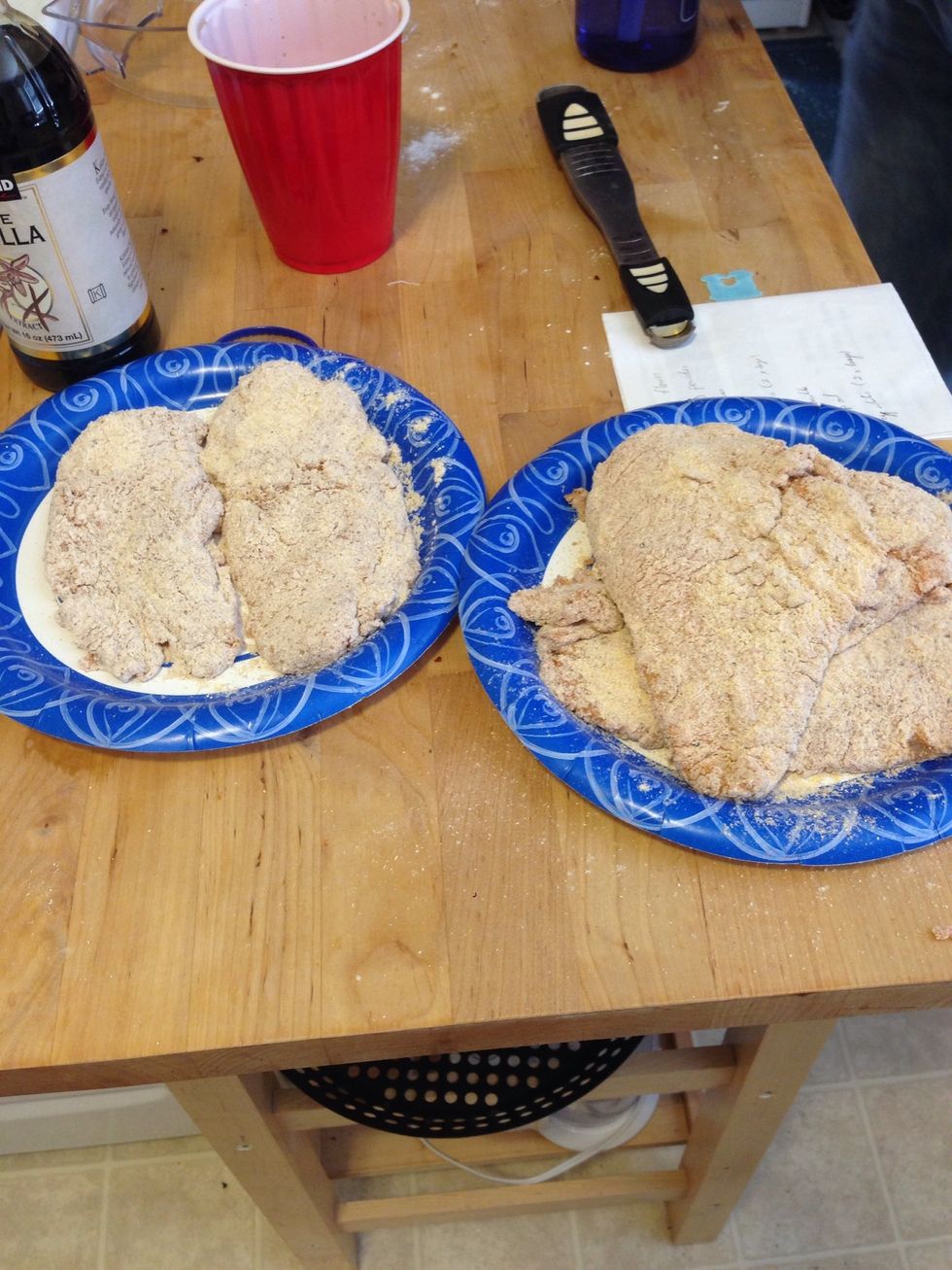 Finish coating the rest of the chicken. For a thicker crust, put the chicken back in the milk and cover with crust mixture again. I put different plates out for spicy vs nonspicy.