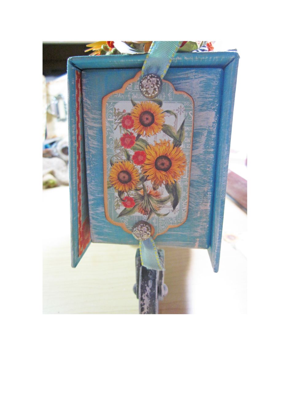 Finish decorating your cart as you wish.  I've used some of the coordinating chipboard, ribbon and more of G45 metal brads but be sure to make it your own.