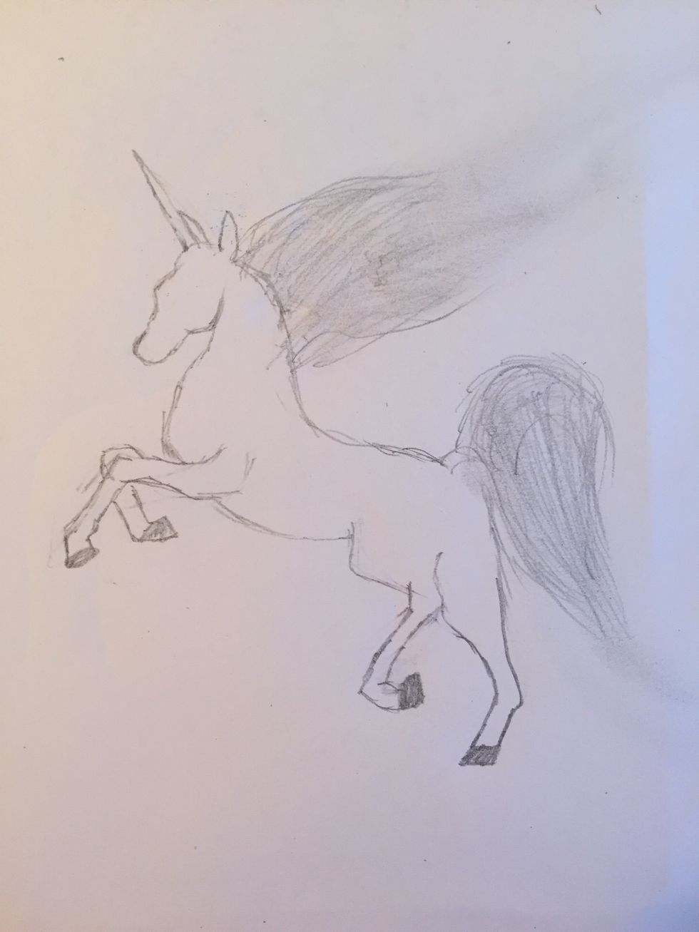 Finish drawing the back half of Sparkles. Again, looking at horse anatomy can really help you get an idea of the shape you need to draw. Then you can add in a tail and a beautiful flowing mane. Blend!