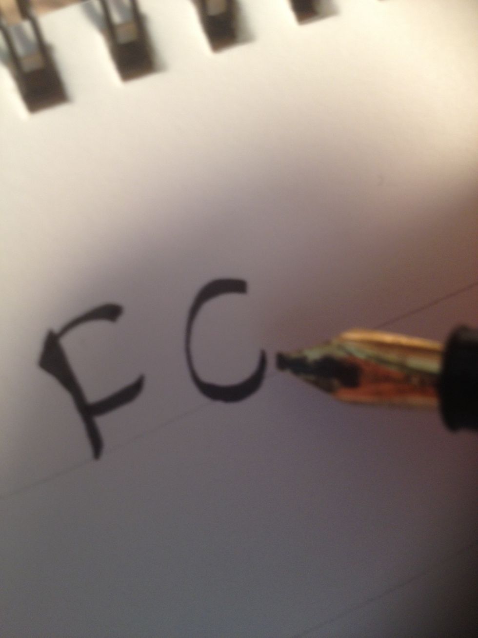 Finish F by putting the bottom bar near the bottom of the trunk and curving it upwards at the end. For G, start with (you guessed it) a Majuscule C.