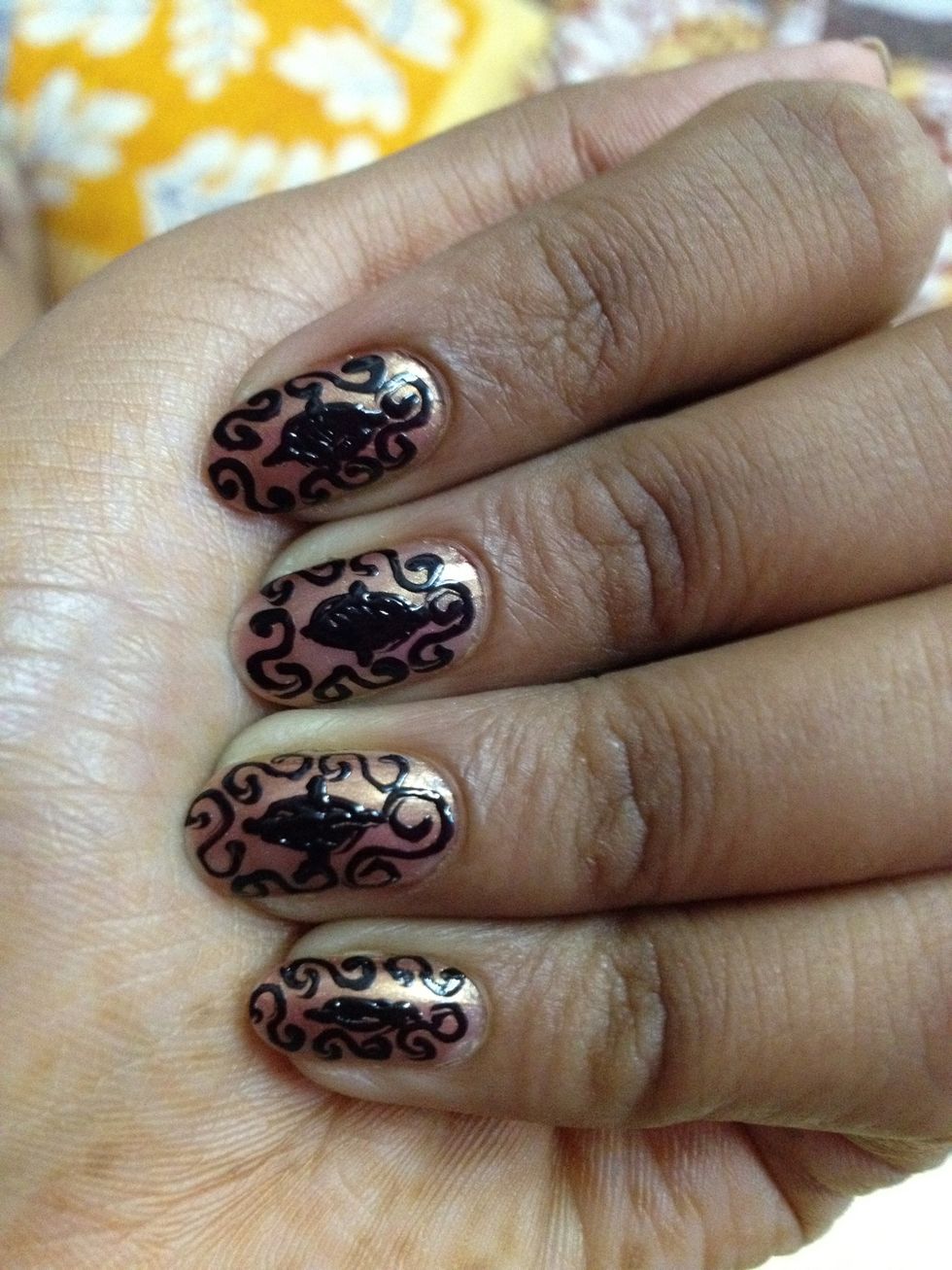 Finish making circles and colour it..u can even use a stone in the middle