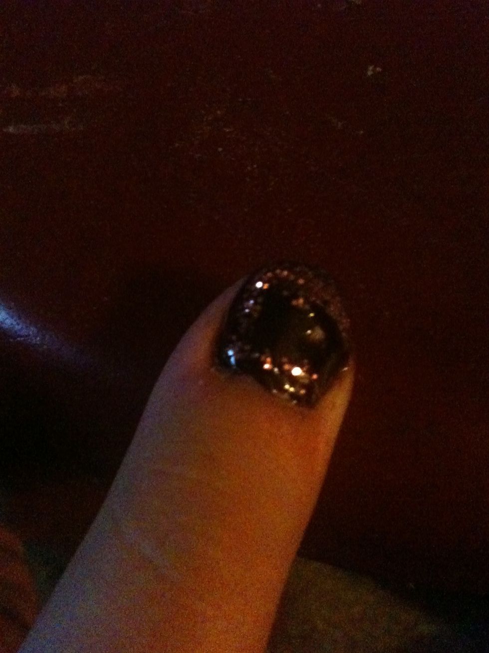 Finish off by adding the sparkle from the middle of your tip to the bottom of the left side.