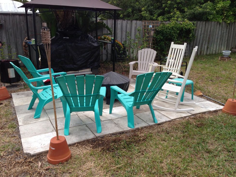 Finish product with chairs, fire pit & grill.