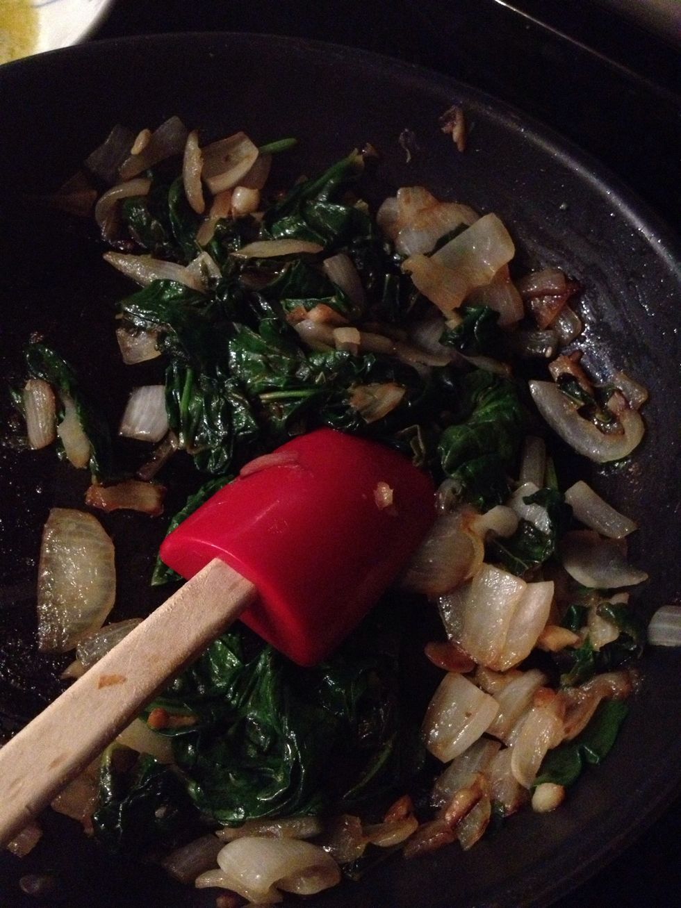Finish stirring everything up and get that spinach wilted and the onions browned.