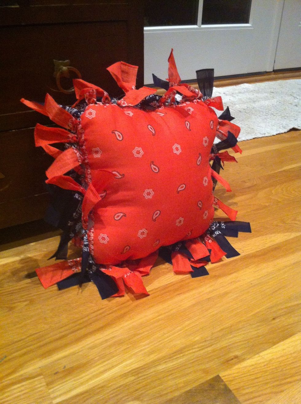 Finish stuffing and tie any untied strips. Now wah la! You have a smaller bandana pillow!