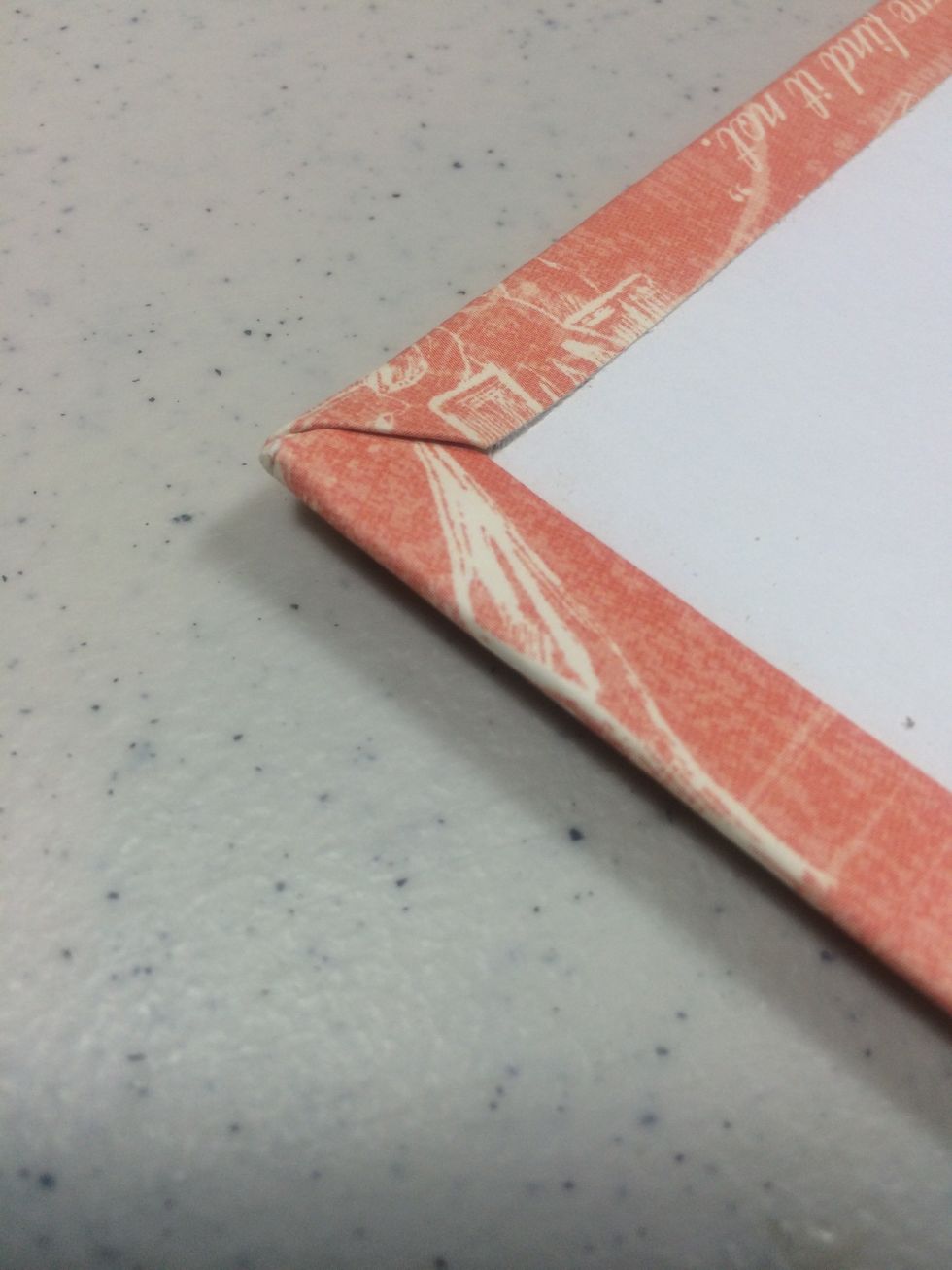 Finish the corners neatly if you like. I adhered the corners first, then folded the rest over it.