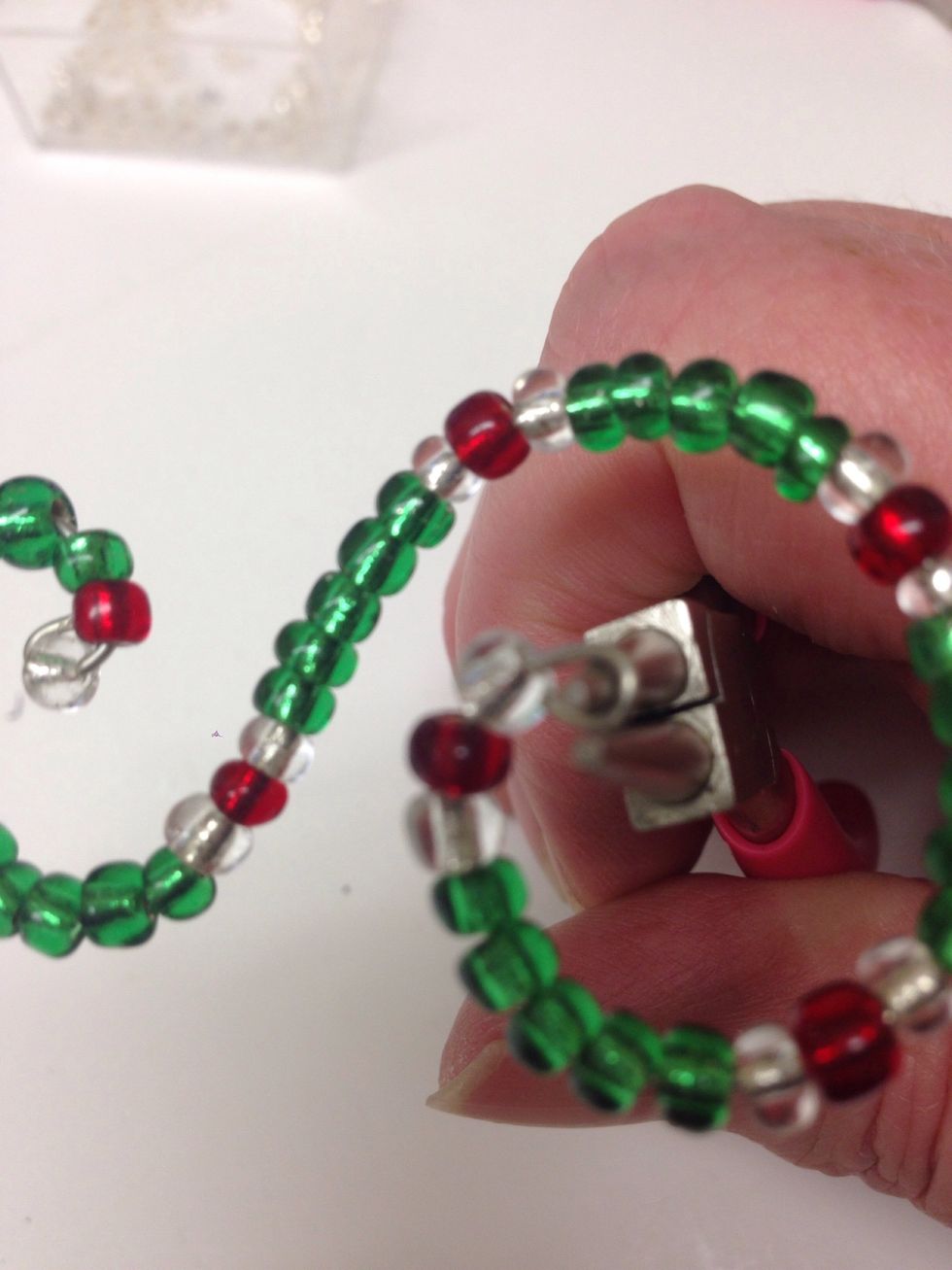 Finish this end using the round nose pliers just like you did in step 8.