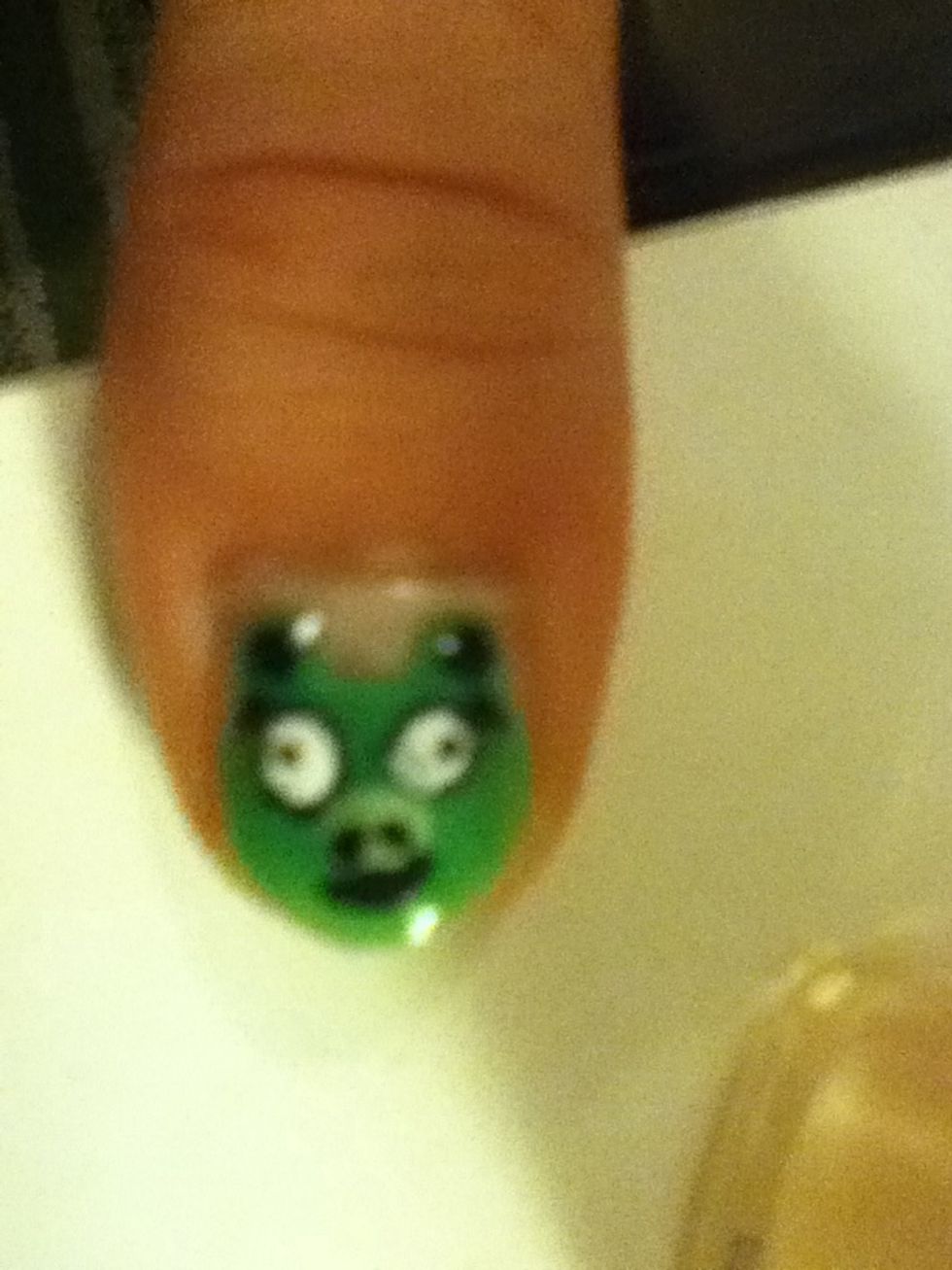 Finish with pupils. When dry, add a clear top coat. That's the piggy done, now for the birds.