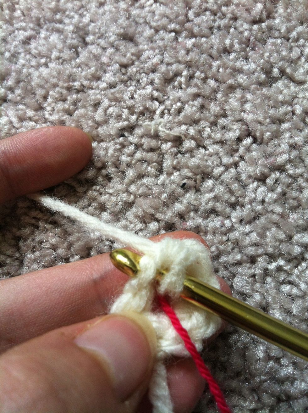 finish your single crochet like normal and insert your hook again in the same stitch (working 2 single crochet in each single crochet of the previous round)