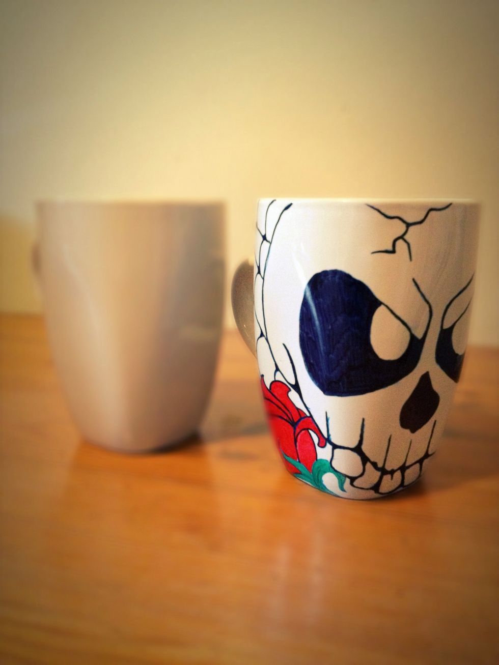 Finished design. Now per the other guides the next step is to place in oven @ 450deg for 30 mins. Haven't done that part since I'm working on the other cup. Doing this should make it permanent.