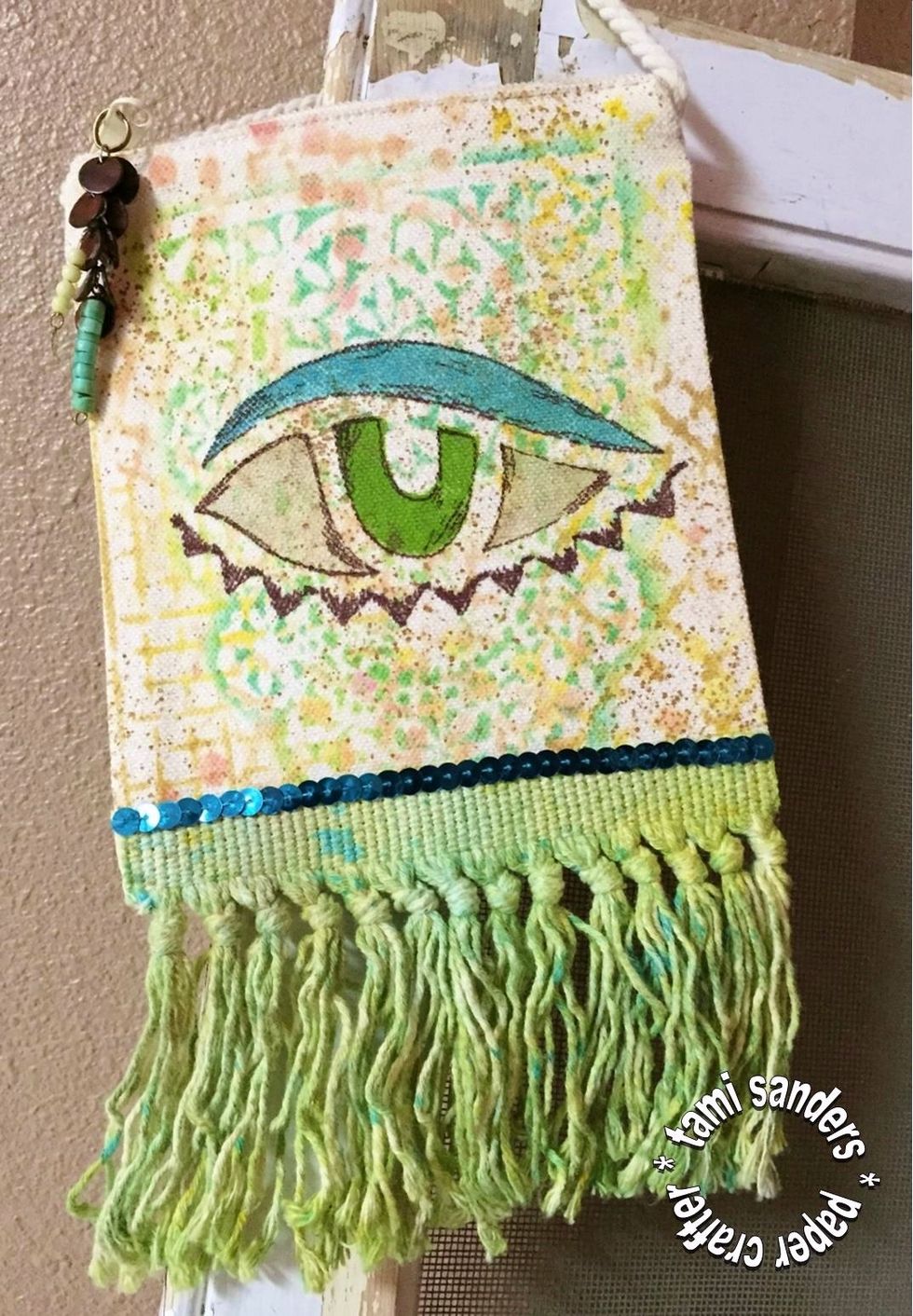 finished embellished bag... please visit The Crafter's Workshop Blog for more GREAT projects... http://www.thecraftersworkshop.com/blog/ * find me at tami sanders*paper crafter... www.tamisanders.com