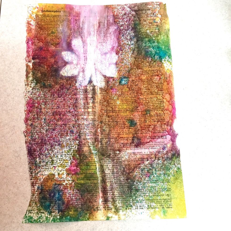 finished monoprint. notice how the paint from the stenciled design flows up - creating a light effect. the paint was spread up slightly because that is the direction i rolled to transfer the design.