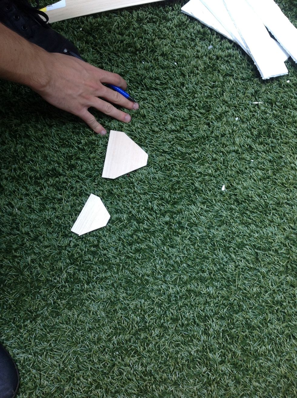 Finished normal and large balsa wood tail wings.