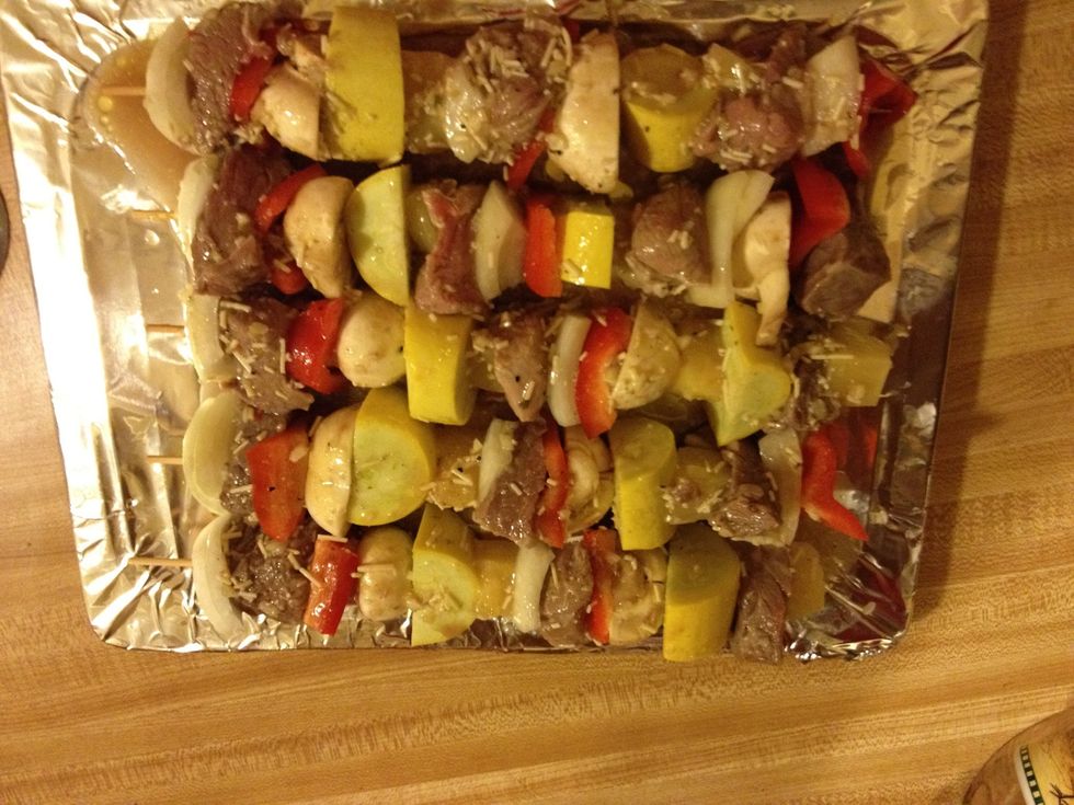 Finished product with left over marinade drizzled over the top of kabobs..