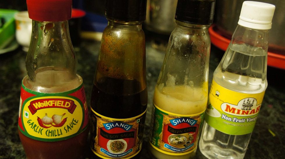 Finishing touch..(red chilli garlic sauce, soya sauce, chilli sauce and vinegar)
