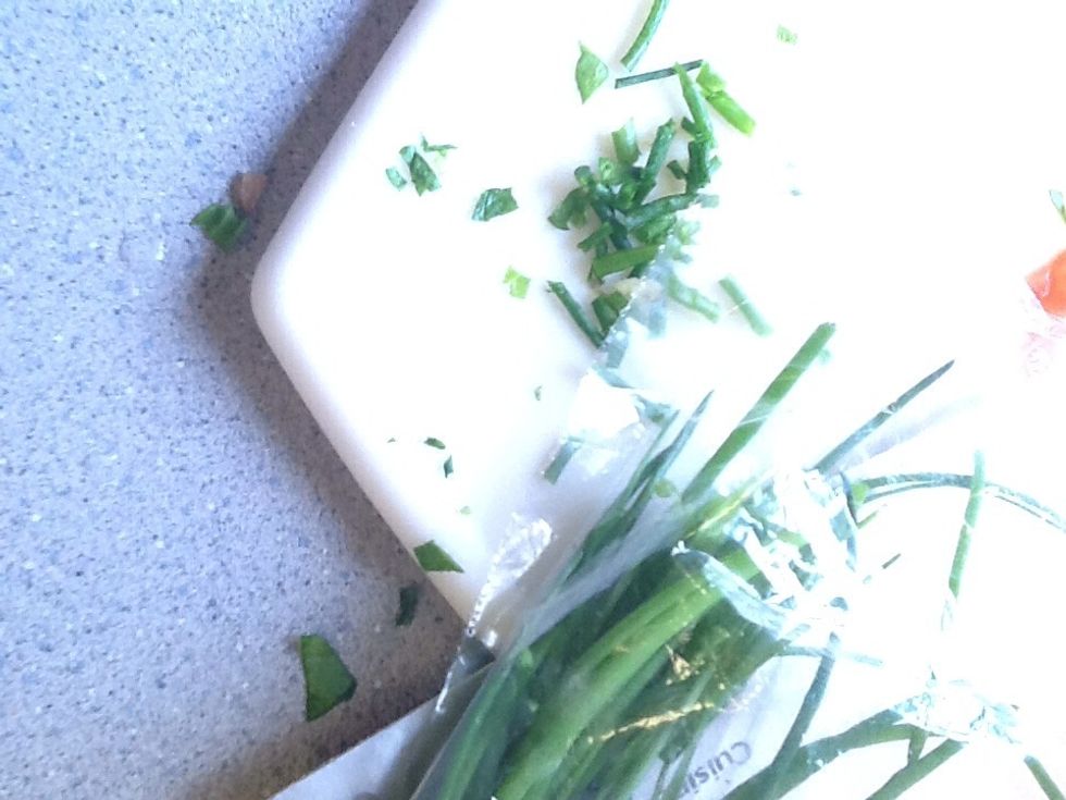 Finley chop up some chives.