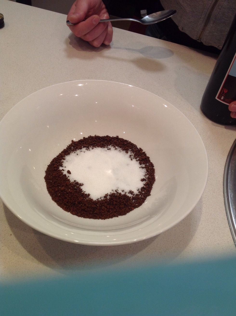 First add 2 table spoons of coffee and sugar into a bowl