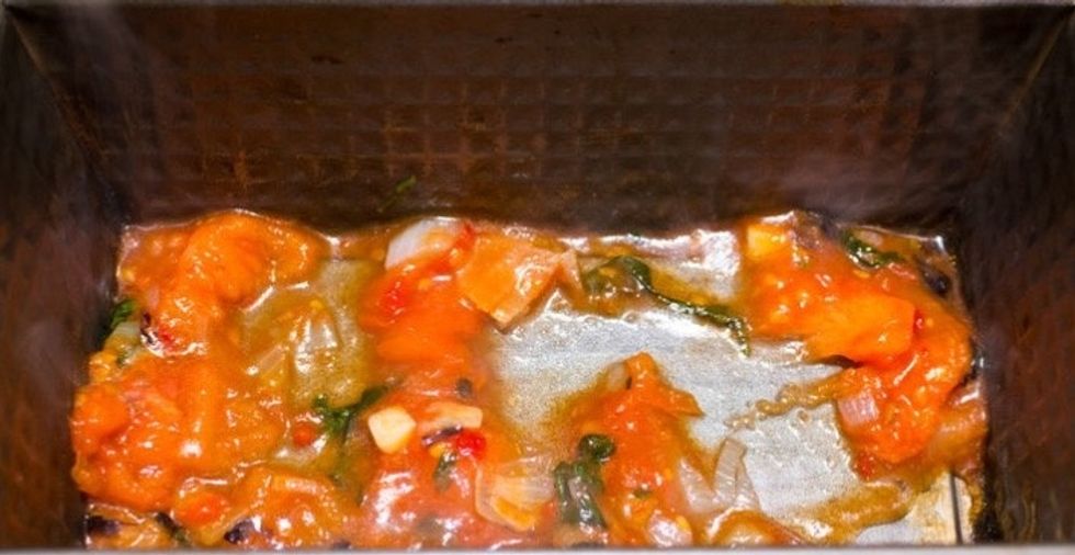 First add in a thin layer of sauce at the bottom of the pan so that the eggplant won't stick