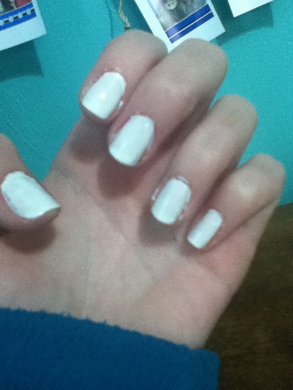 First, apply a base coat and 1-2 coats of white nail polish sorry mines really messy..