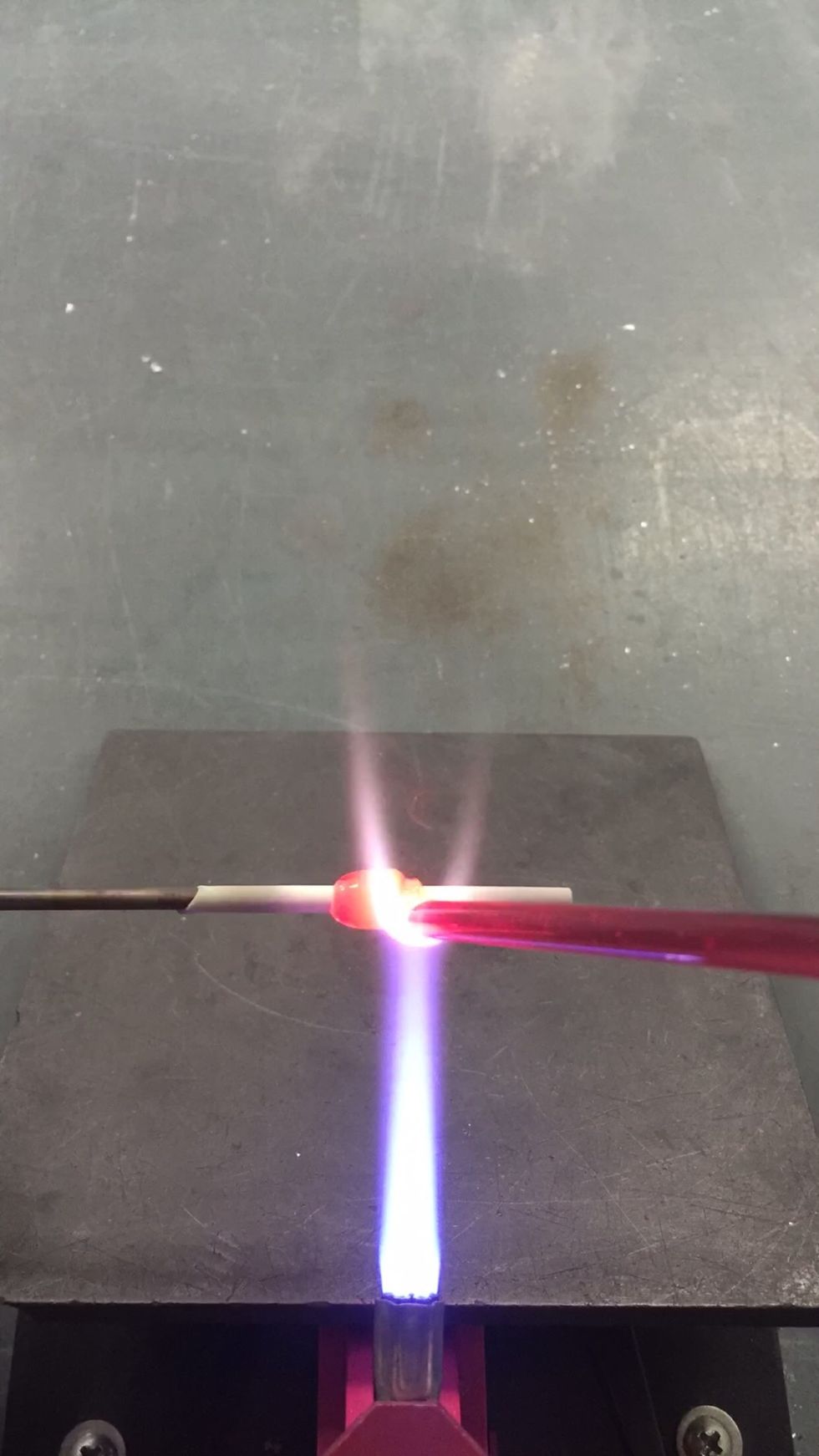 First, apply some Rhea to the mandrel.