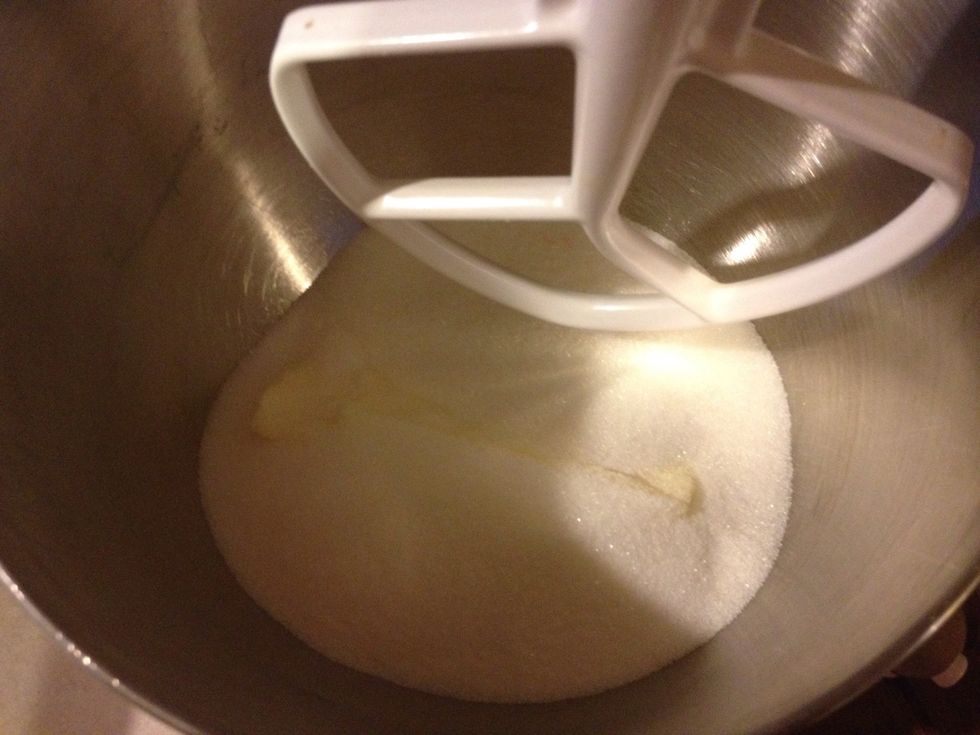 First beat together the shortening and sugar. I use the butter flavored Crisco. The sticks are 1 cup each so you don't have to measure it.