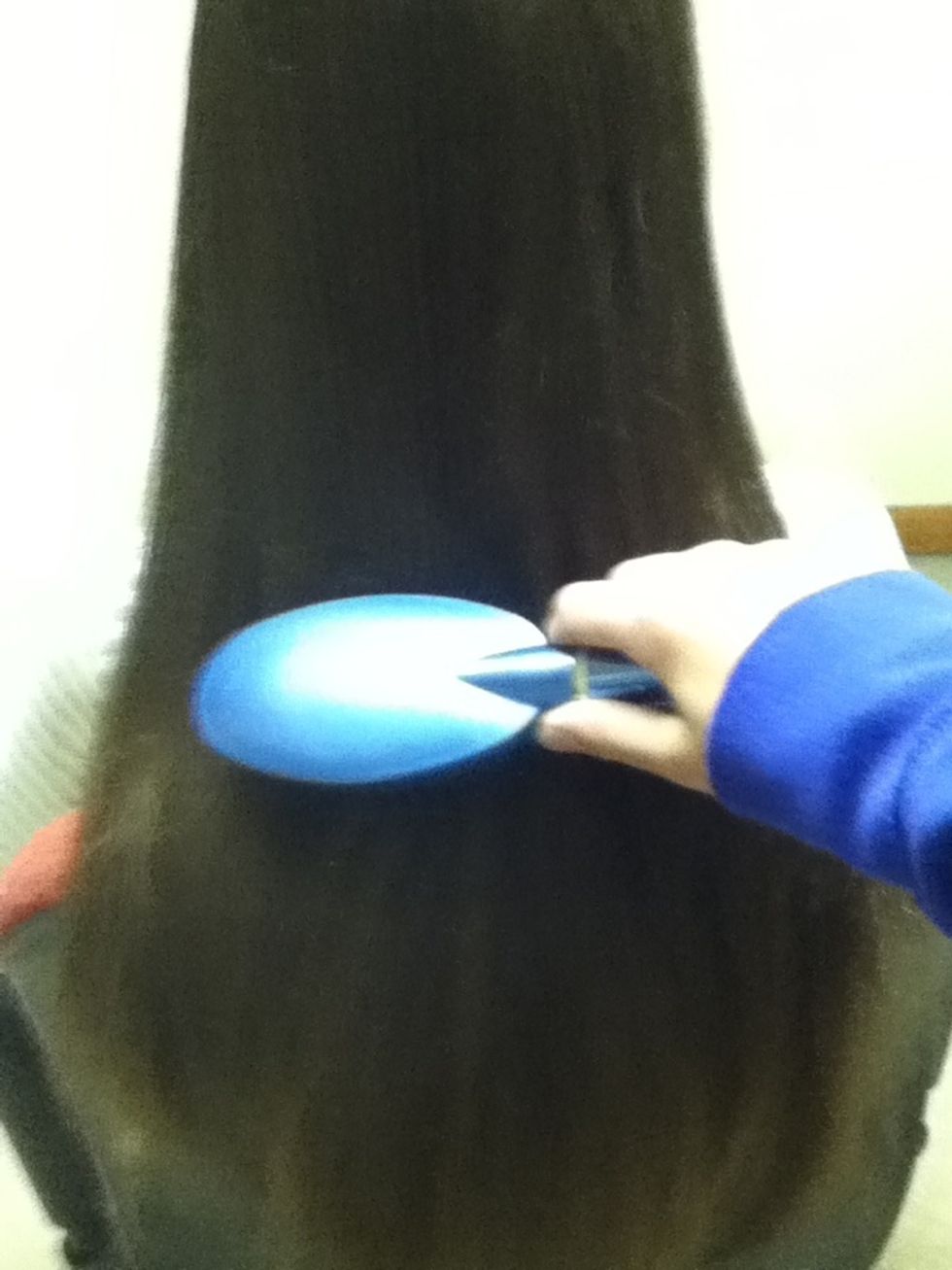First, brush hair thoroughly until its smooth and knot-free. This will make the process a lot easier. (Tip. This style works best in long or medium length hair.)