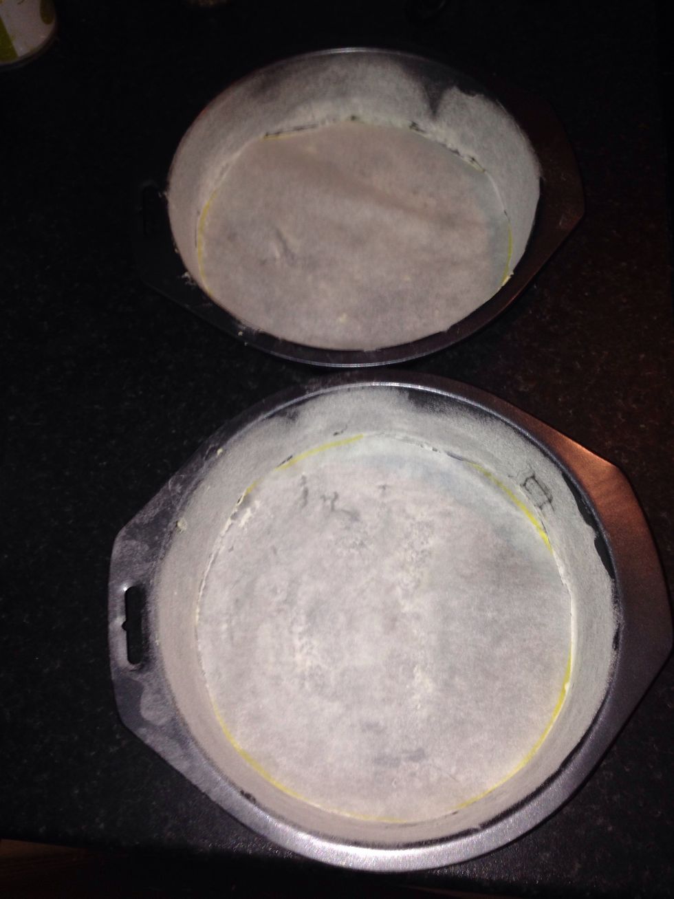 First butter and flour 20cm cake tins to stop the sponge from sticking, I also lined the bottoms of the tins with some parchment paper to help the none sticking
