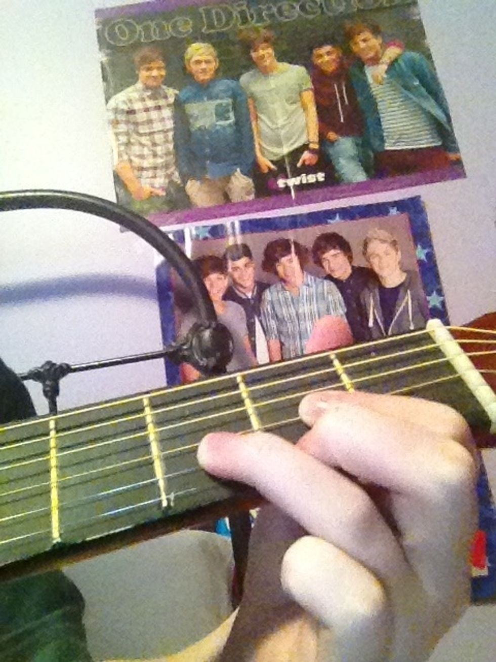 First chord is D (first finger: third string, second fret; second finger: first string second fret; third finger: second string third fret)