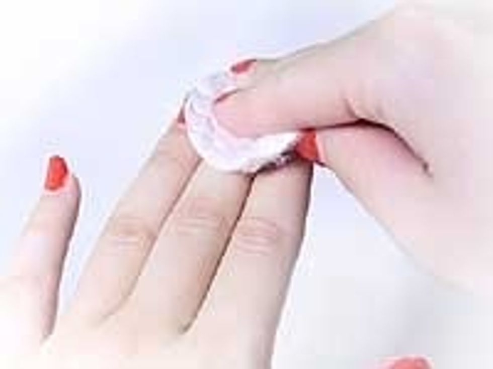 First clean the nail polish you have on off with the nail polish remover and cotton balls