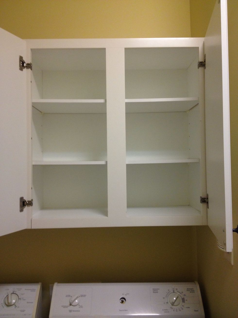 First, clear out the cabinets!