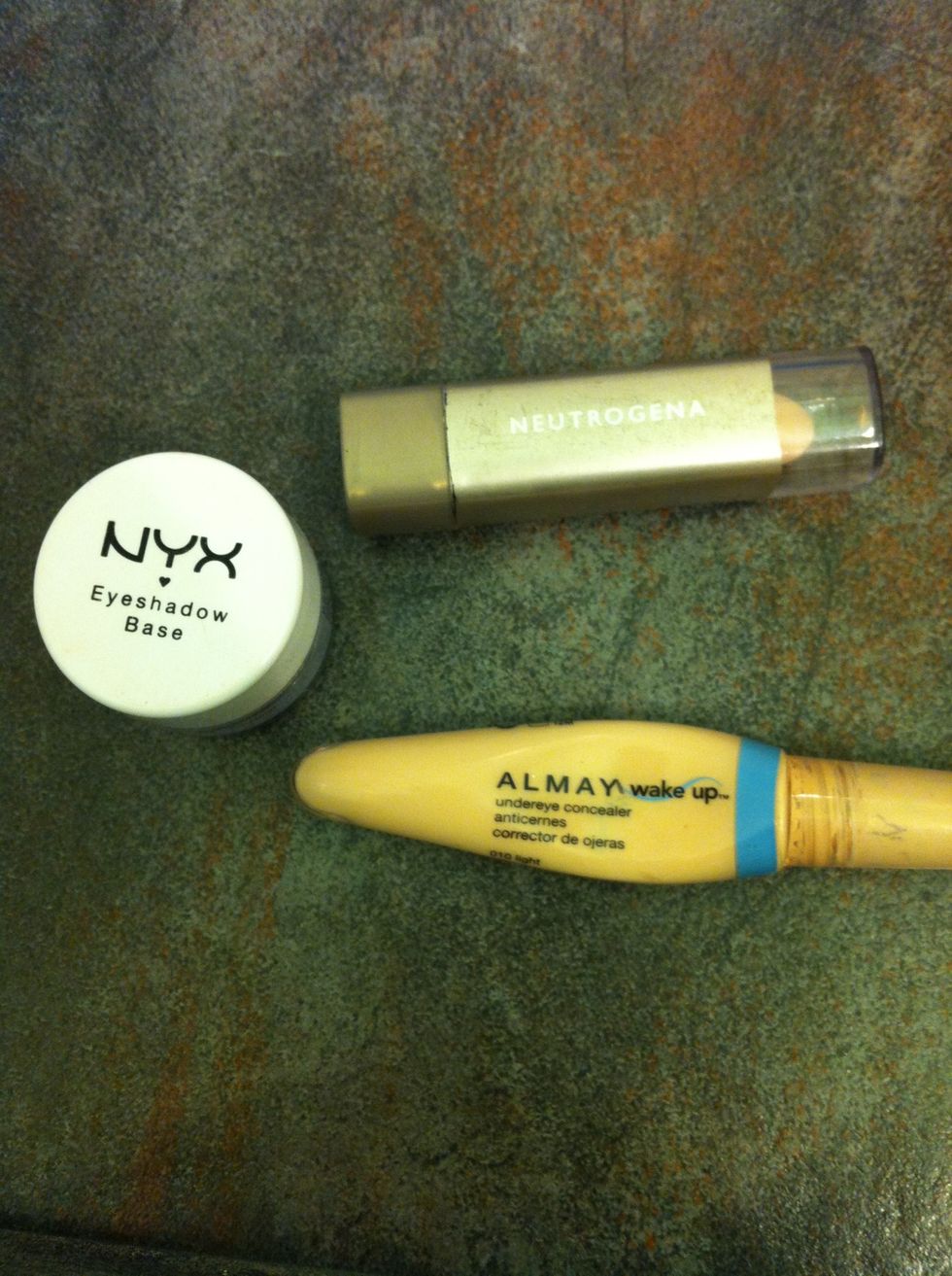 First, conceal under your eyes and prime your lids.