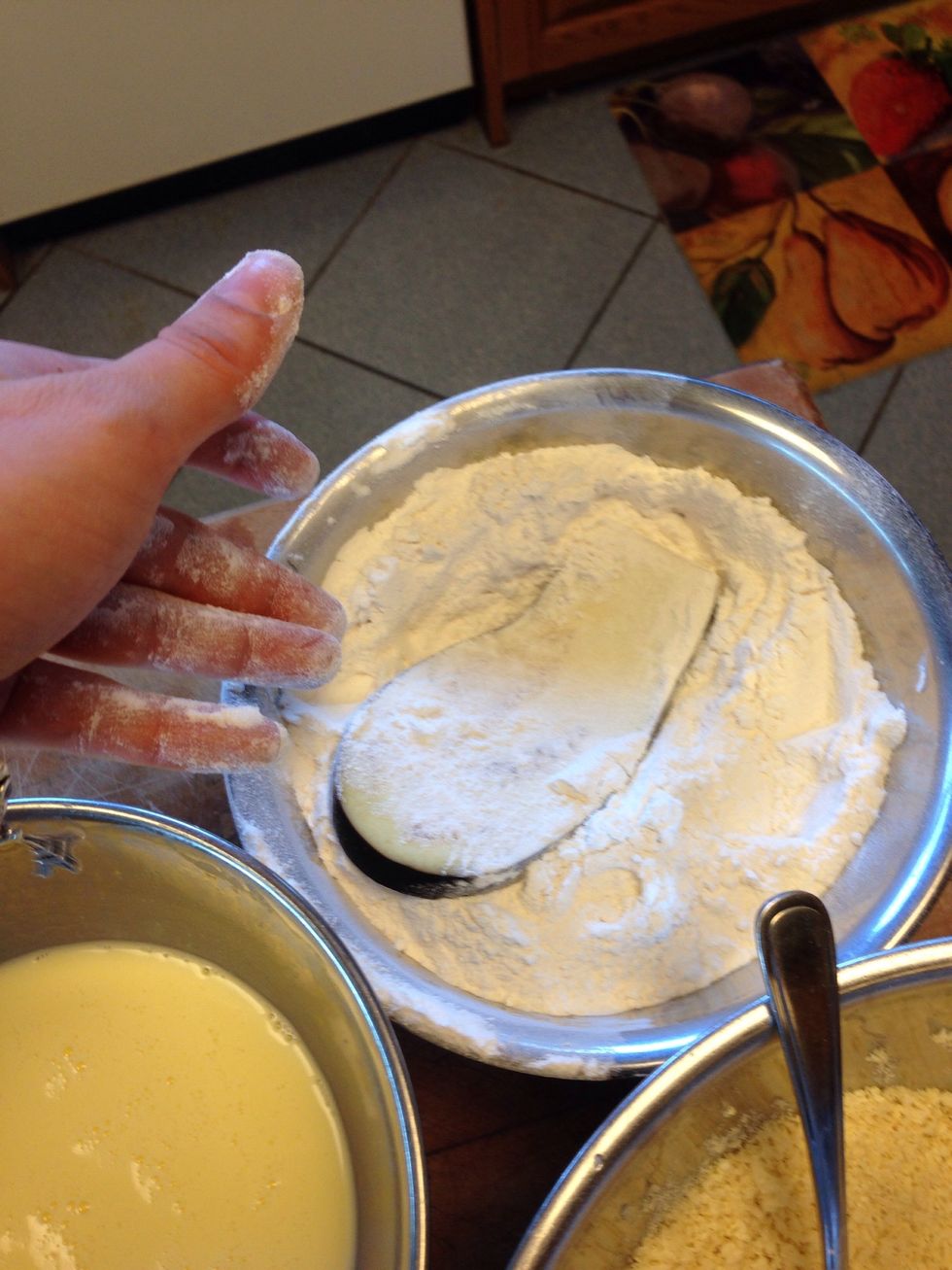 First, cover eggplant in flour