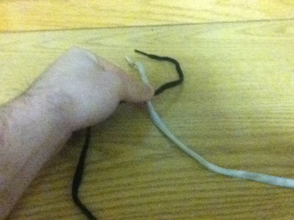 First, cross the two lines across each other.