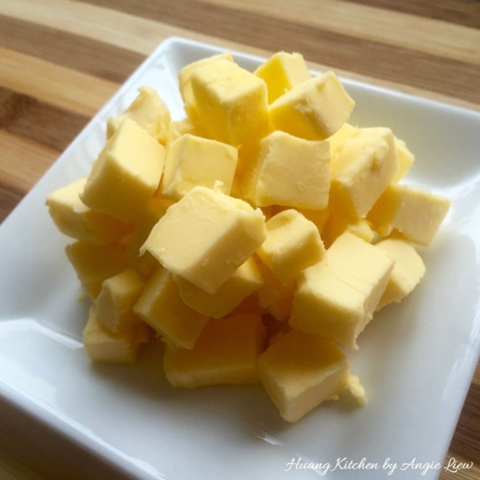 First cut butter into small cubes. This makes combining butter with other ingredients easier. Leave to soften to room temperature (about 20 minutes).