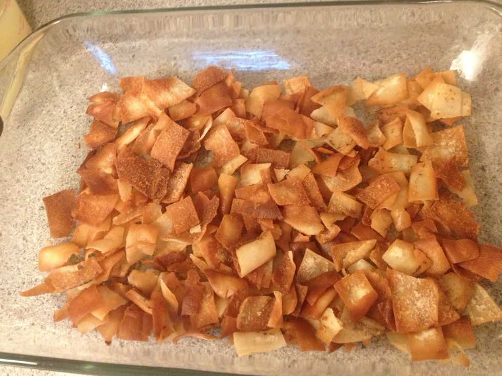 First cut some PETA bread and fry then in the oil to make the first level of the dish >>