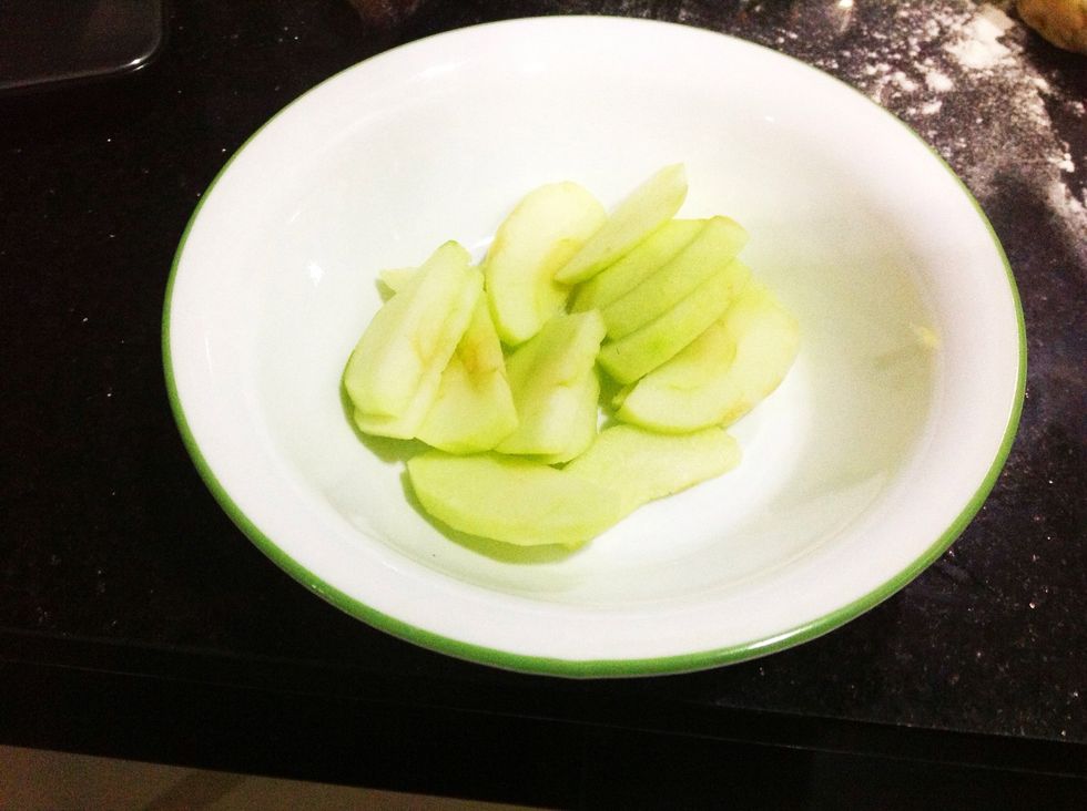 First, cut the apples to 1/4 inch-thick slices. Of course the apple has to be peeled and cored.