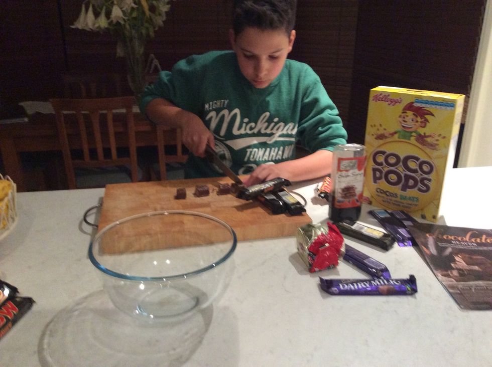 First cut up your 5 Mars bars sliced in centre metres