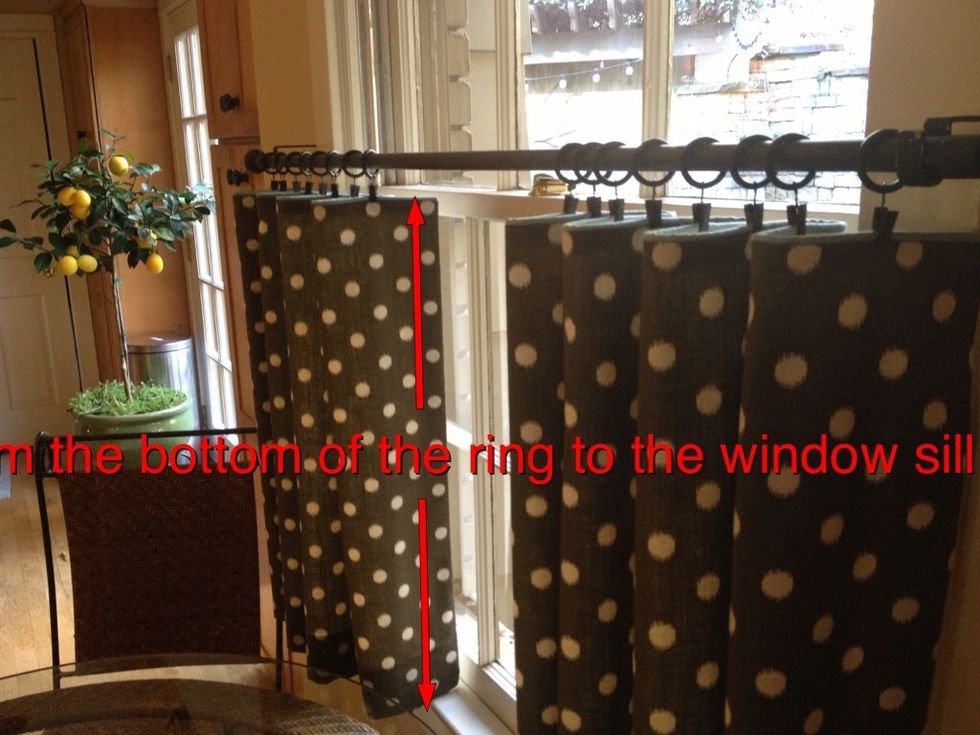 First determine the finished length of your curtains. Hang your rod with rings. Measure from bottom of the ring to the window sill. Subtract 1/2". This will be your finished length. Ours was 27".