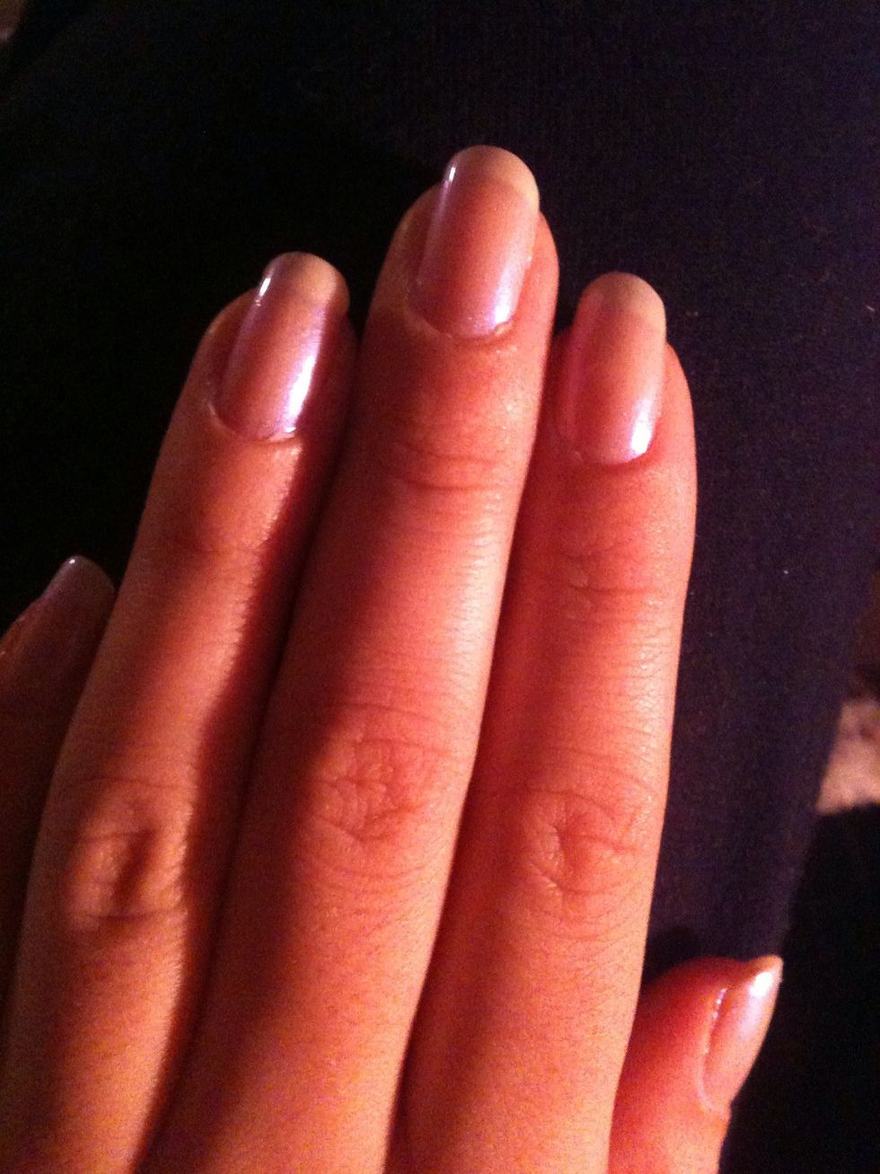 First do your base coat (no photo) then do a coat or two of your pale pink. I used Pink Glass by Sinful Colors, even better though if you have the natural color from a French manicure set.