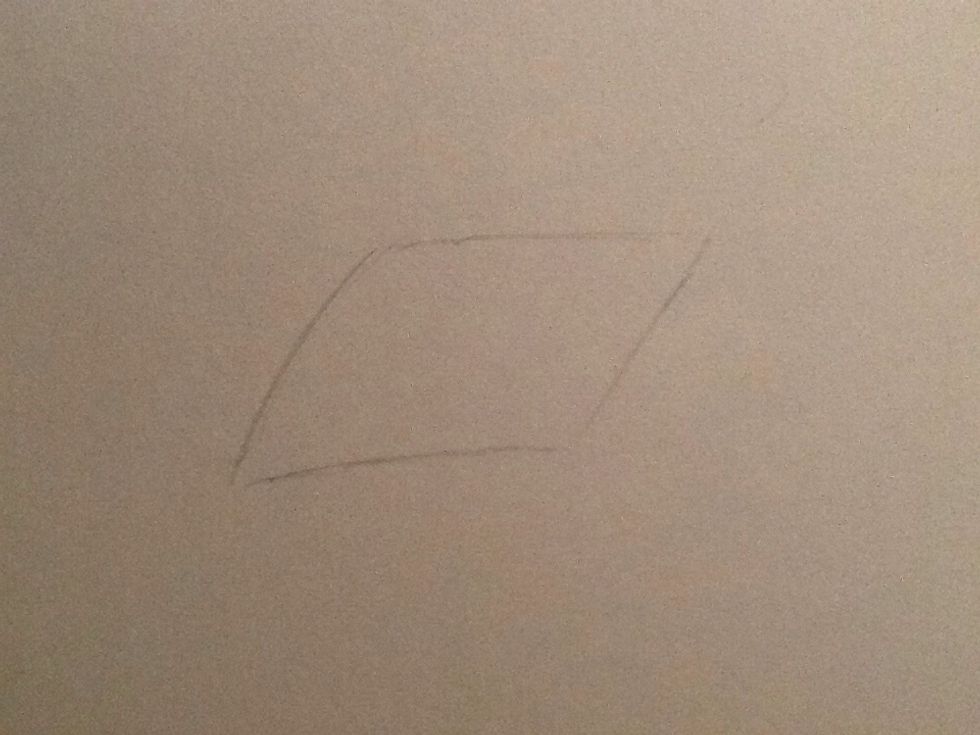 First, draw a parallelogram kinda shape. This will be the main base sketch for the eye. Make sure you draw it lightly so you can erase it!
