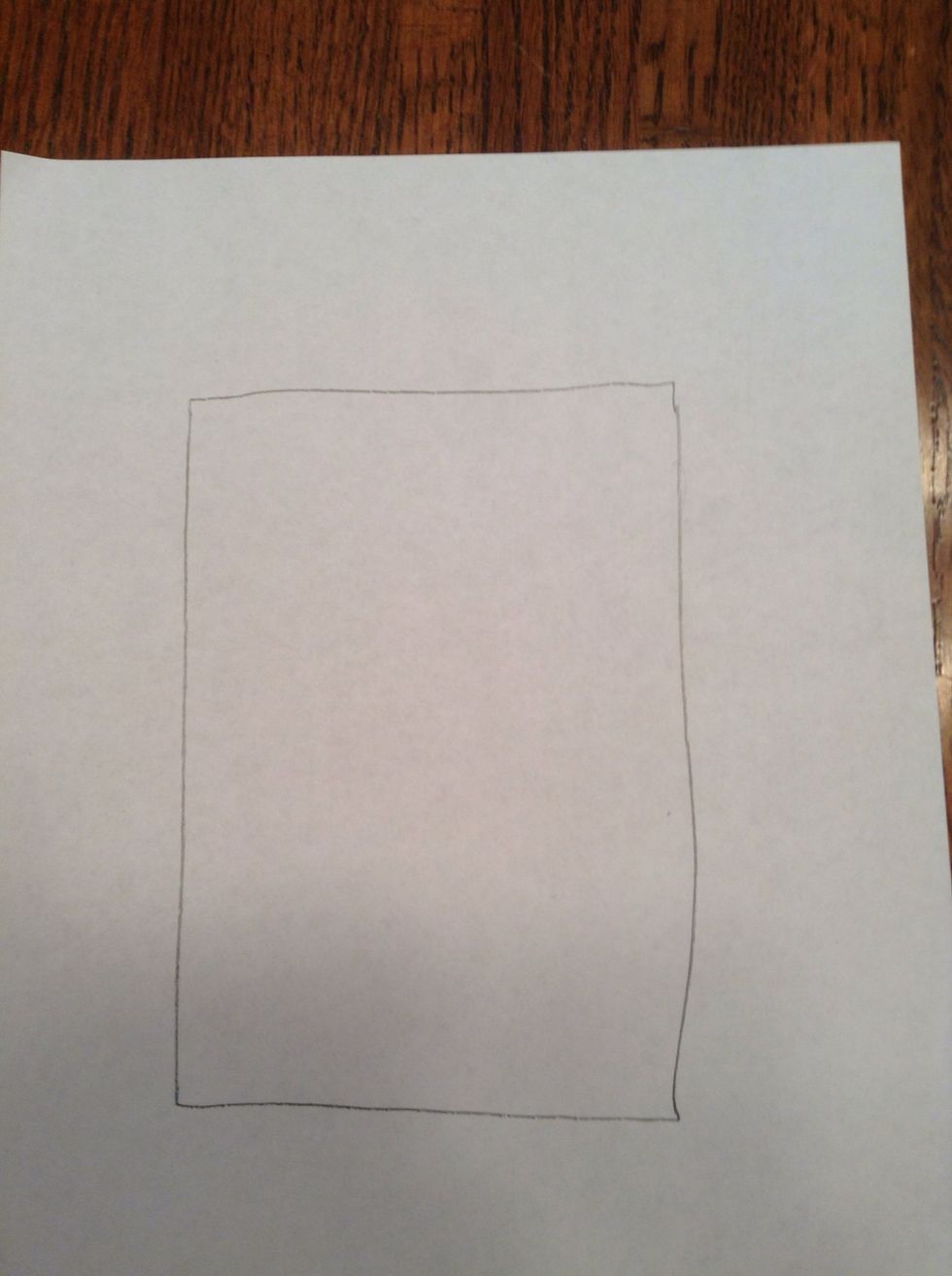First, draw a rectangle on your paper.