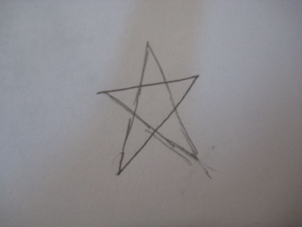 First, draw a simple star.