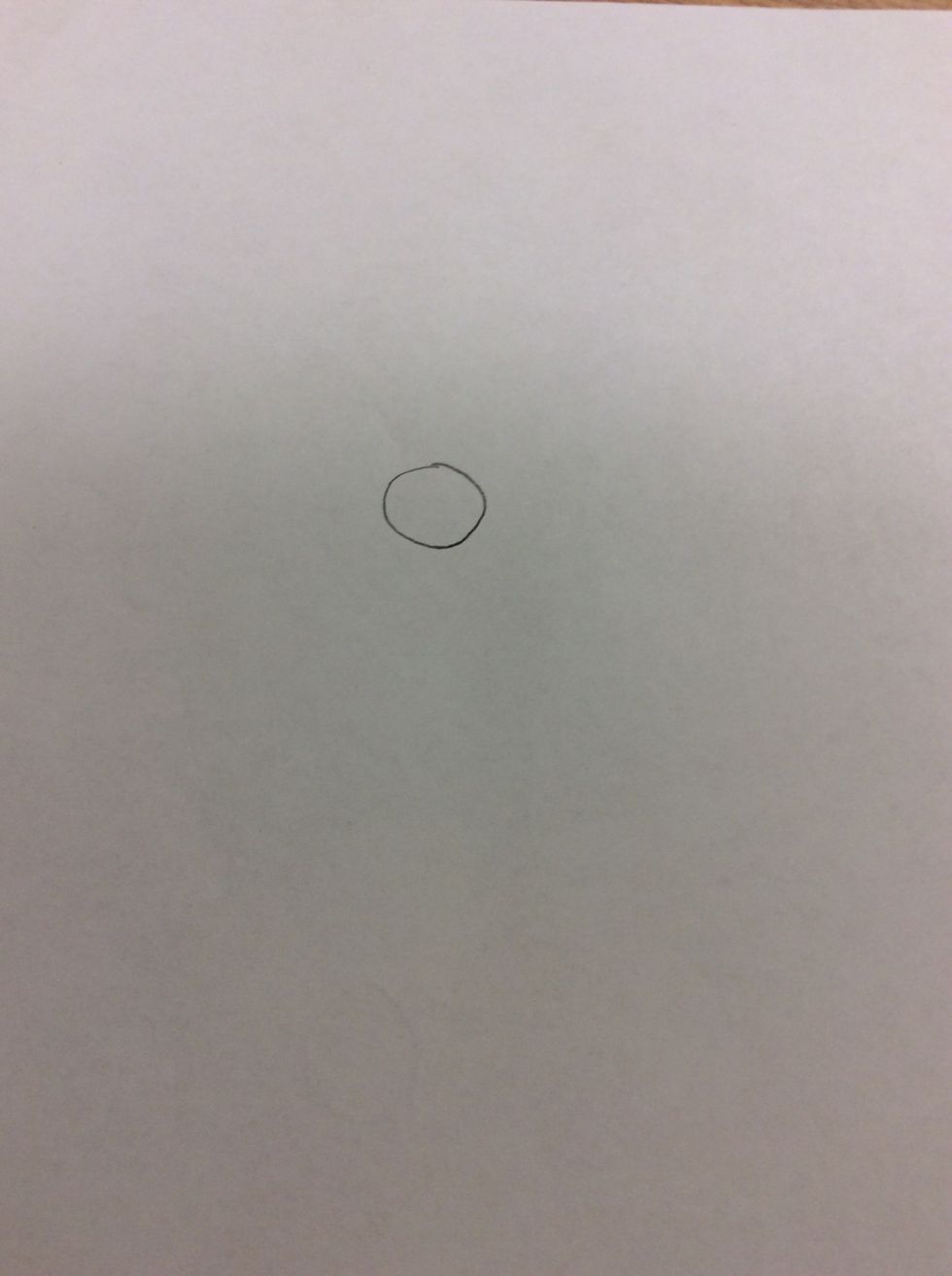 First draw a small circle.