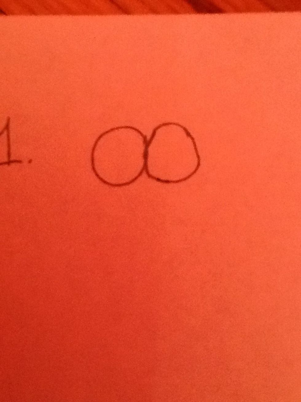First draw two circles next to eachother