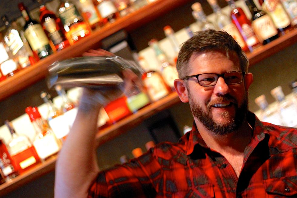 First dry shake (without ice) to emulsify the egg whites. Then shake with ice until nice and frosty.