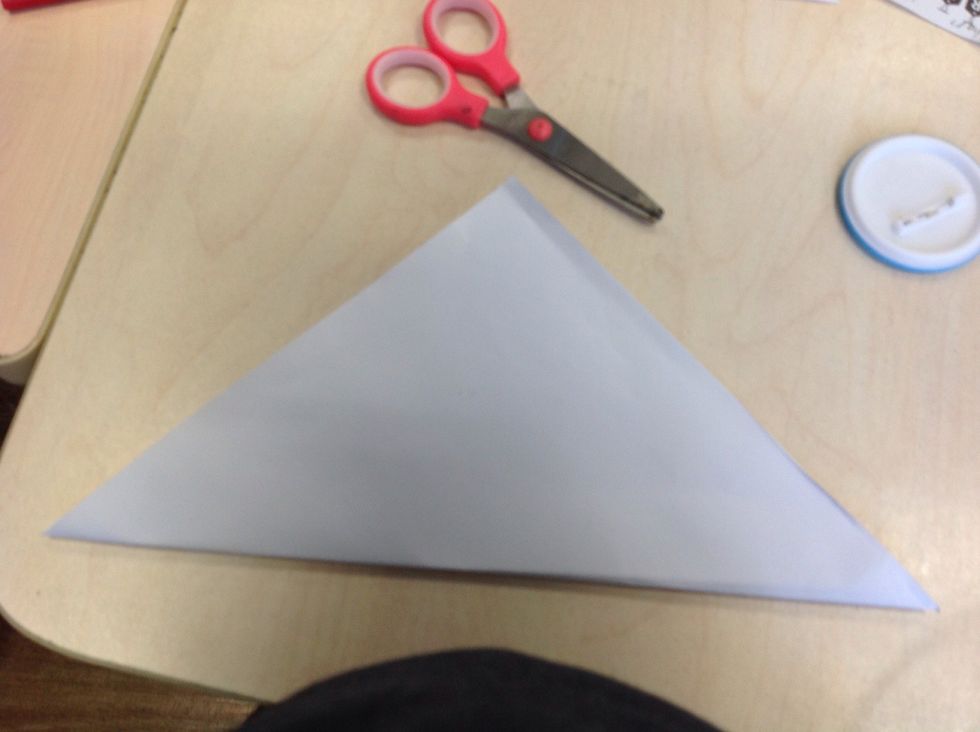 First Fold the paper half.