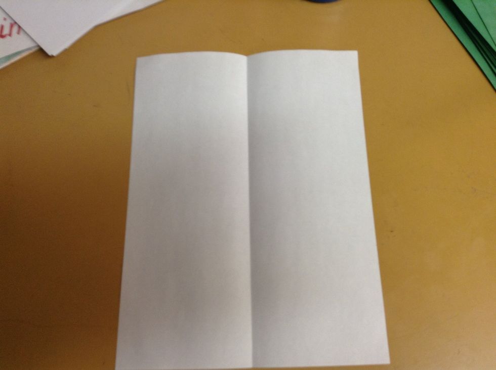 First fold your paper in half like a hotdog
